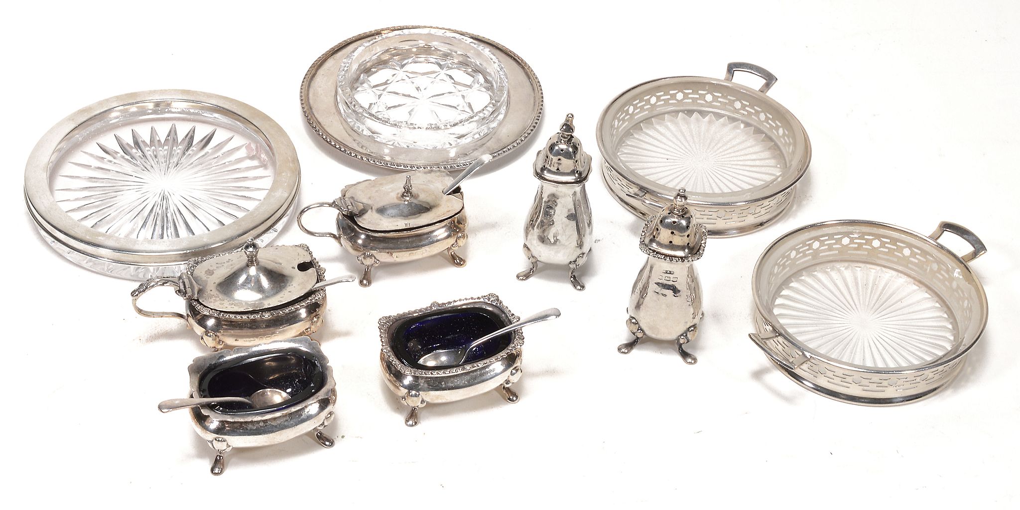 A collection of silver, to include: a three piece baluster condiment set by E A collection of