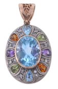 A blue topaz and multi gem set pendant, the central collet set oval cut blue... A blue topaz and