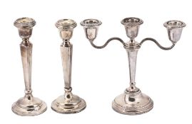 A silver two branch candelabra by Elkington & Co A silver two branch candelabra by Elkington & Co.,