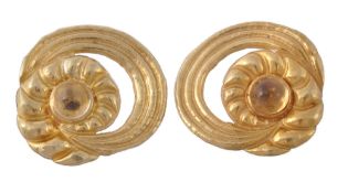 A pair of citrine earrings, the gold coloured textured swirls set with a... A pair of citrine