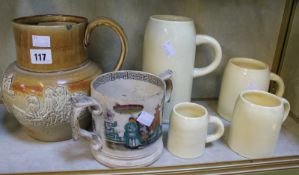 A graduated set of measuring jugs, a stoneware harvest jug and two Gaudy Welsh jugs (7)