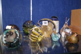 A group of nine mixed modern collectible glass paperweights including a Selkirk Glass weight