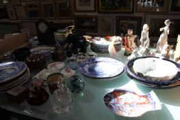 A mixed quantity of ceramics to include five Royal Copenhagen, Lladro and Nao figures, a Royal