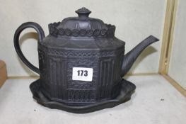 A Staffordshire black basalt teapot & cover; and an associated teapot stand