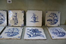 A group of eighteen predominately 18th Century English blue and white Delft tiles, including