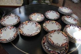 A Royal Crown Derby (1270 pattern) part dinner service comprising an extensive mix of plates, bowls