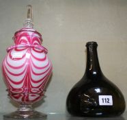 A pink and white overlay glass jar and cover; 32cm high together with an 18th Century style green