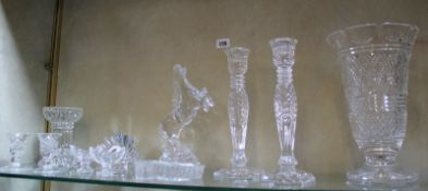 A group of Waterford crystal items including a pair of candlesticks; 25.5cm high, a model of a