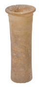 An Egyptian cylindrical alabaster jar, probably Dynasty I-II, circa 3100-2686 B.C., with raised