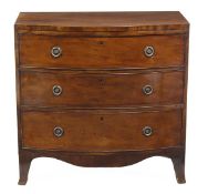 A George III mahogany chest of drawers, circa 1790, with three long drawers on outswept legs, 89.