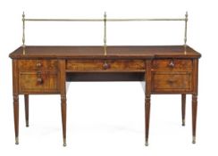 A Regency mahogany and boxwood strung breakfront sideboard, circa 1815, with a brass rear gallery, w