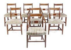 A set of eight Regency mahogany dining chairs, circa 1815, including a pair of armchairs, each