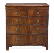 A George III mahogany chest of drawers, circa 1800, with two short and three long drawers on