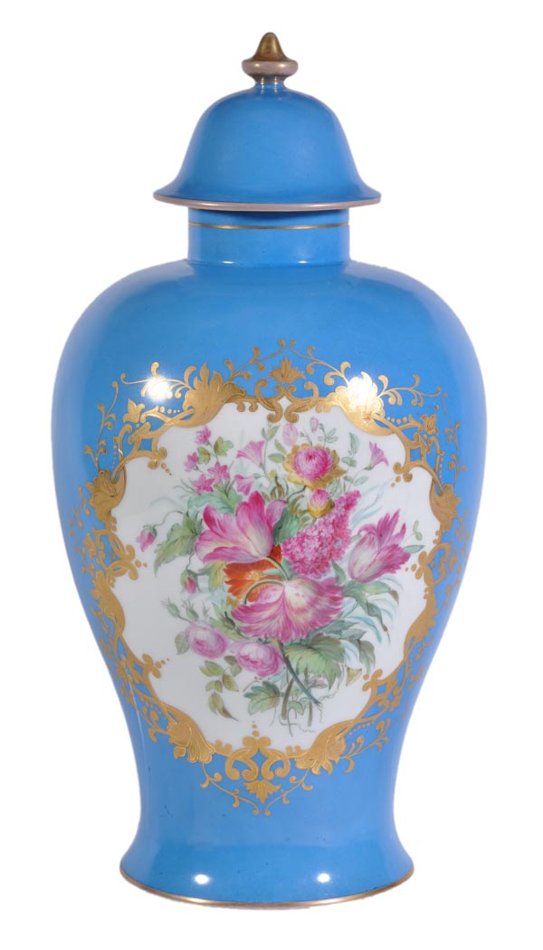 A Berlin (KPM) turquoise-ground baluster vase and domed cover, painted with a panel of flowers,