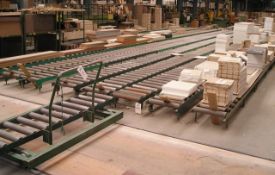 Fifteen runs of various gravity roller conveyors, each up to 500mm wide and approx. 18m long with