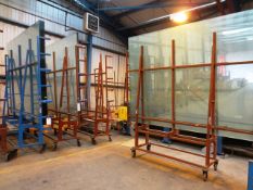 Four mobile glass stands, approx. sheet capacity 3.2 x 2.2m (Please note; includes the glass stock