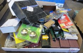 Two boxes of assorted door handles, hinges, letter box, fittings etc.