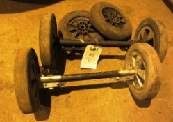 Two sets of pedestrian platform wheels and axles, with two additional wheels (located at Unit 10,