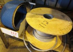 Part reel of electrical cable and 4" abrasive band facing consumable stock (located at Unit 10,