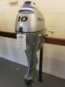 Honda Model BF9.9D/10D outboard motor, S/No. BAB J-1702041 7.4 kw, Grey with tank and Honda