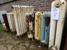 28 various size and style cast iron radiators