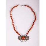 AN OLD AGATE NECKLACE WITH PENDANT