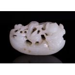 WHITE JADE TOGGLE CARVED BOY ON BOAT