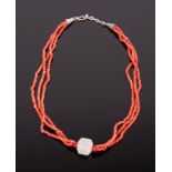 CORAL BEADS AND WHITE JADE NECKLACE