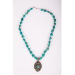 A TURQUOISE BEADS NECKLACE