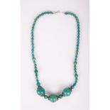 A TURQUOISE BEADS NECKLACE