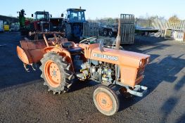 Kubota L1500 2 wheel drive diesel compact tractor
S/N: 28410
Recorded Hours: 914
c/w rotovator