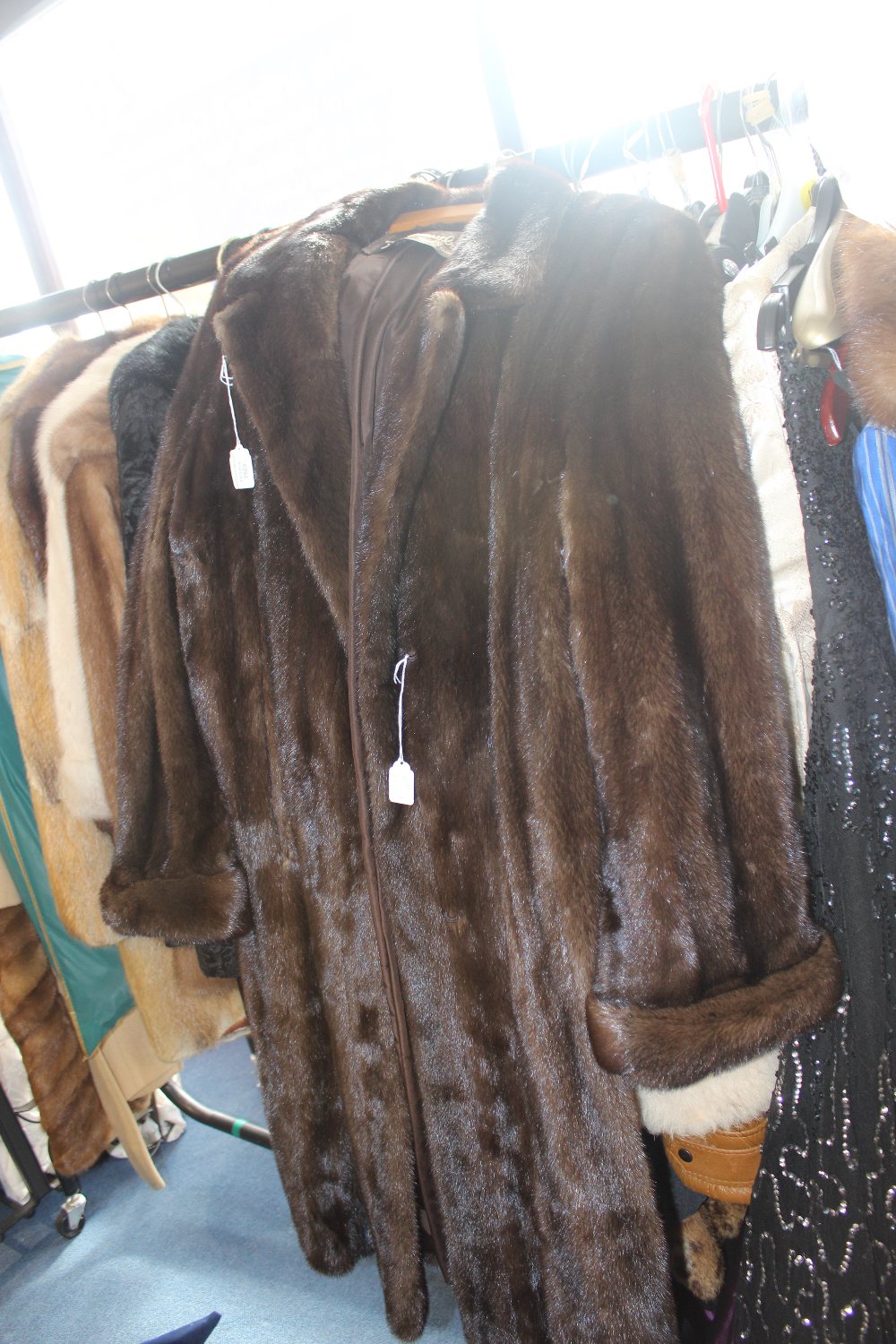 A ladies calf length mink coat by Alixandre of New York