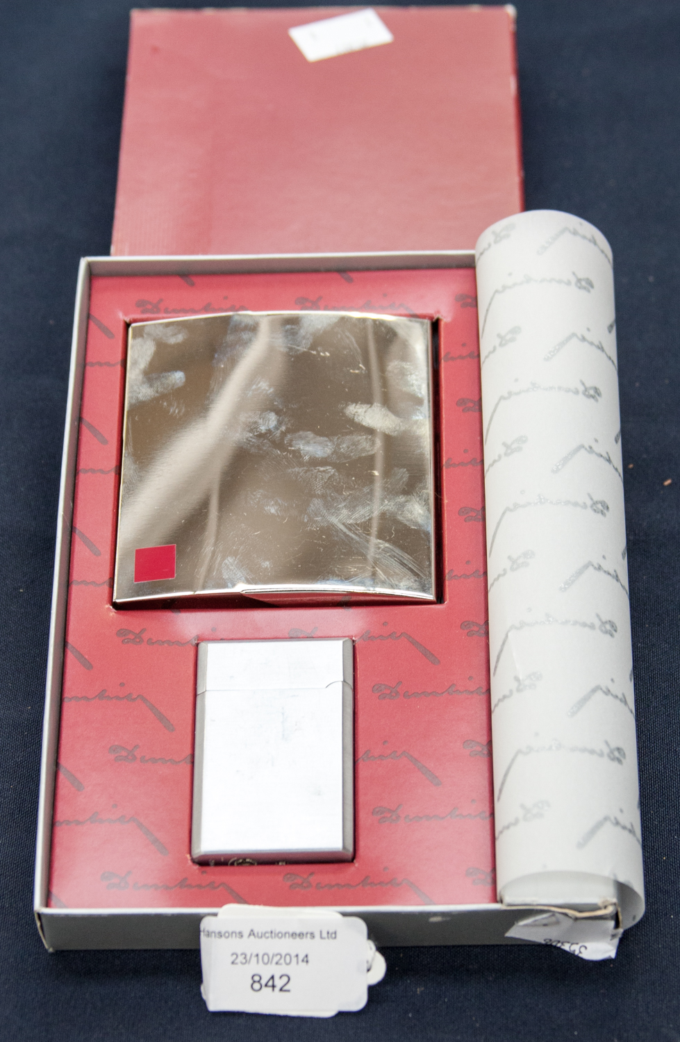 A Dunhill stainless steel lighter and cigarette case in original card packaging, circa 1990