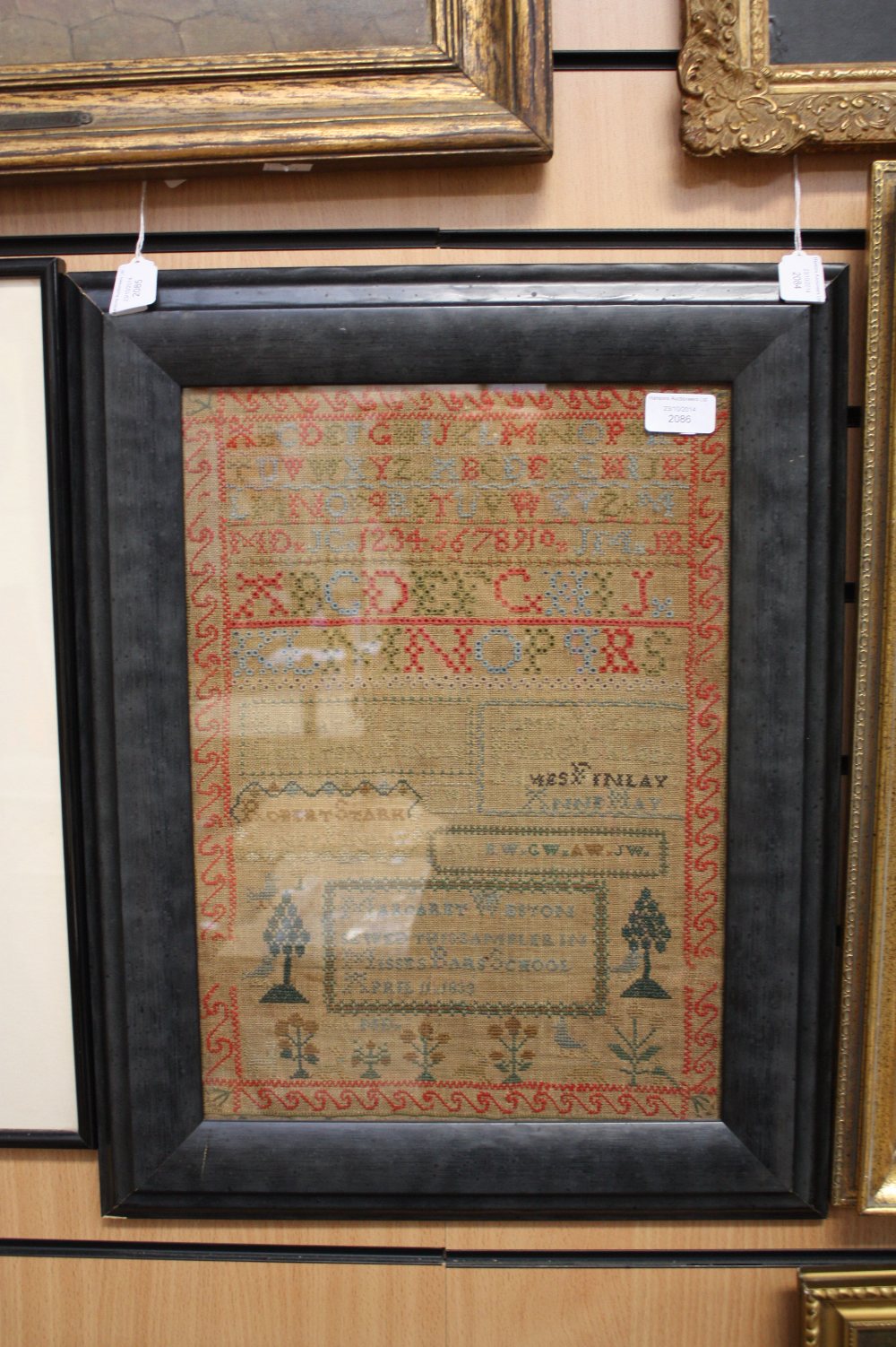 A 19th century sampler, alphabet and numbers, by Margaret Weston, 1833, 42cm x 30cm
