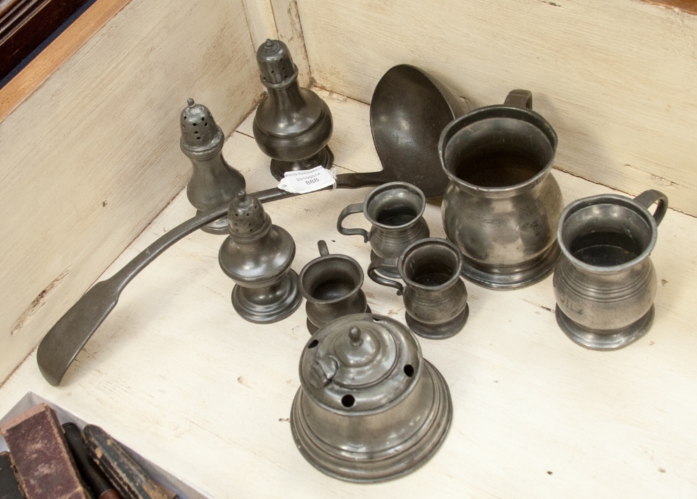 Collection of five pewter tankards, three peppers, a ladle and an inkwell (10)