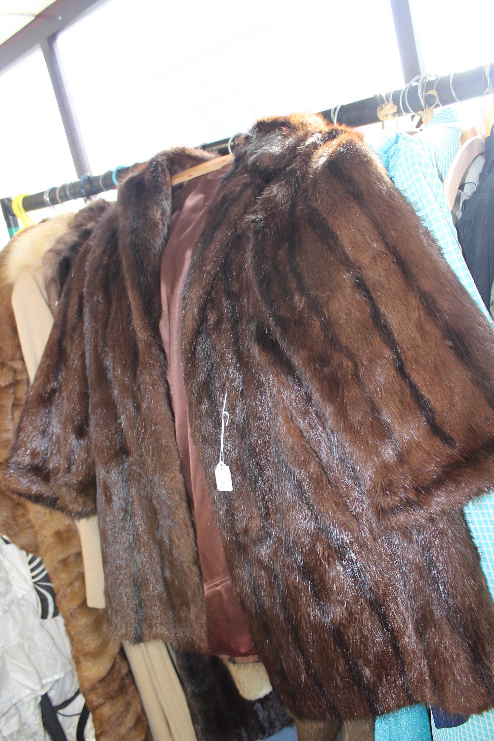 A dark brown ladies Mink jacket