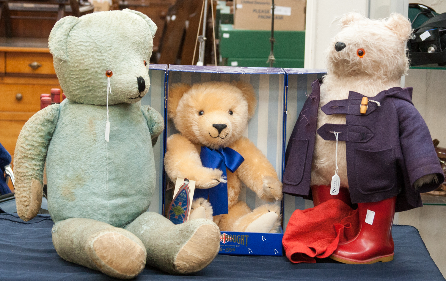 A Merrythought boxed teddy bear; together with a pale blue bear and a further Gabrielle clothed
