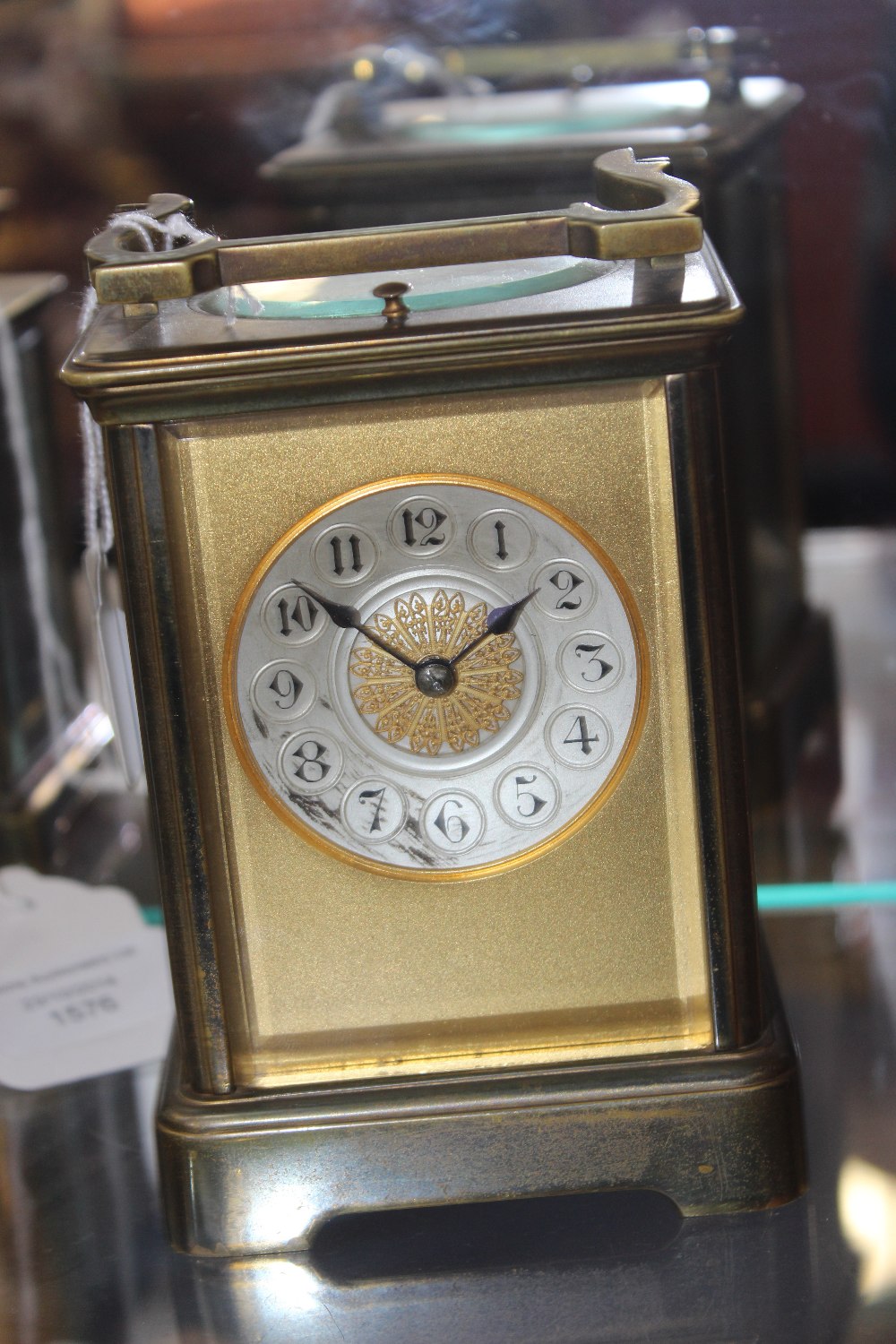 A late 19th Century four glass carriage clock, brass case, by R & Co, Paris, striking the half