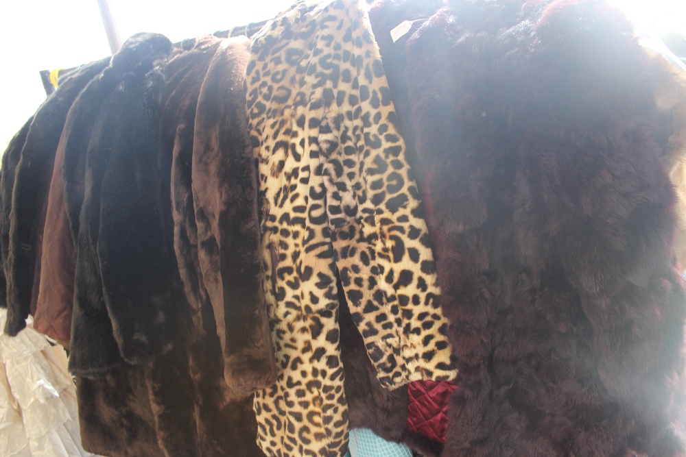 A vintage acrylic fur coat, a Leopard print fur coat and two other fur coats (4)