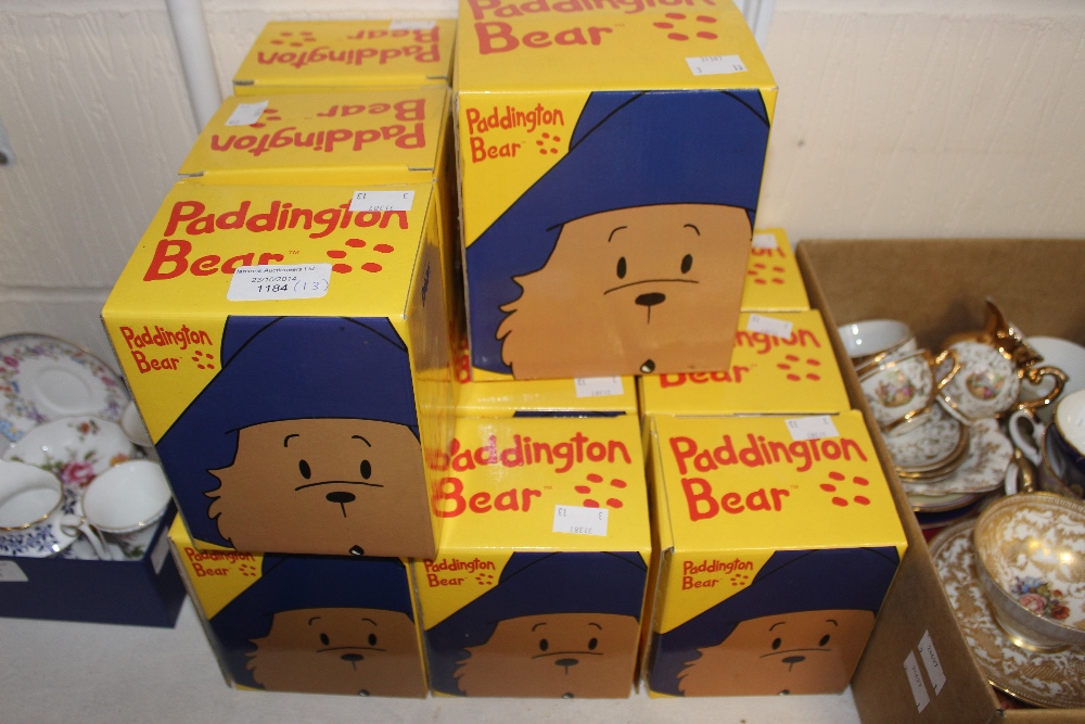 A Coalport collection of thirteen Paddington bear figures, all with original boxes
