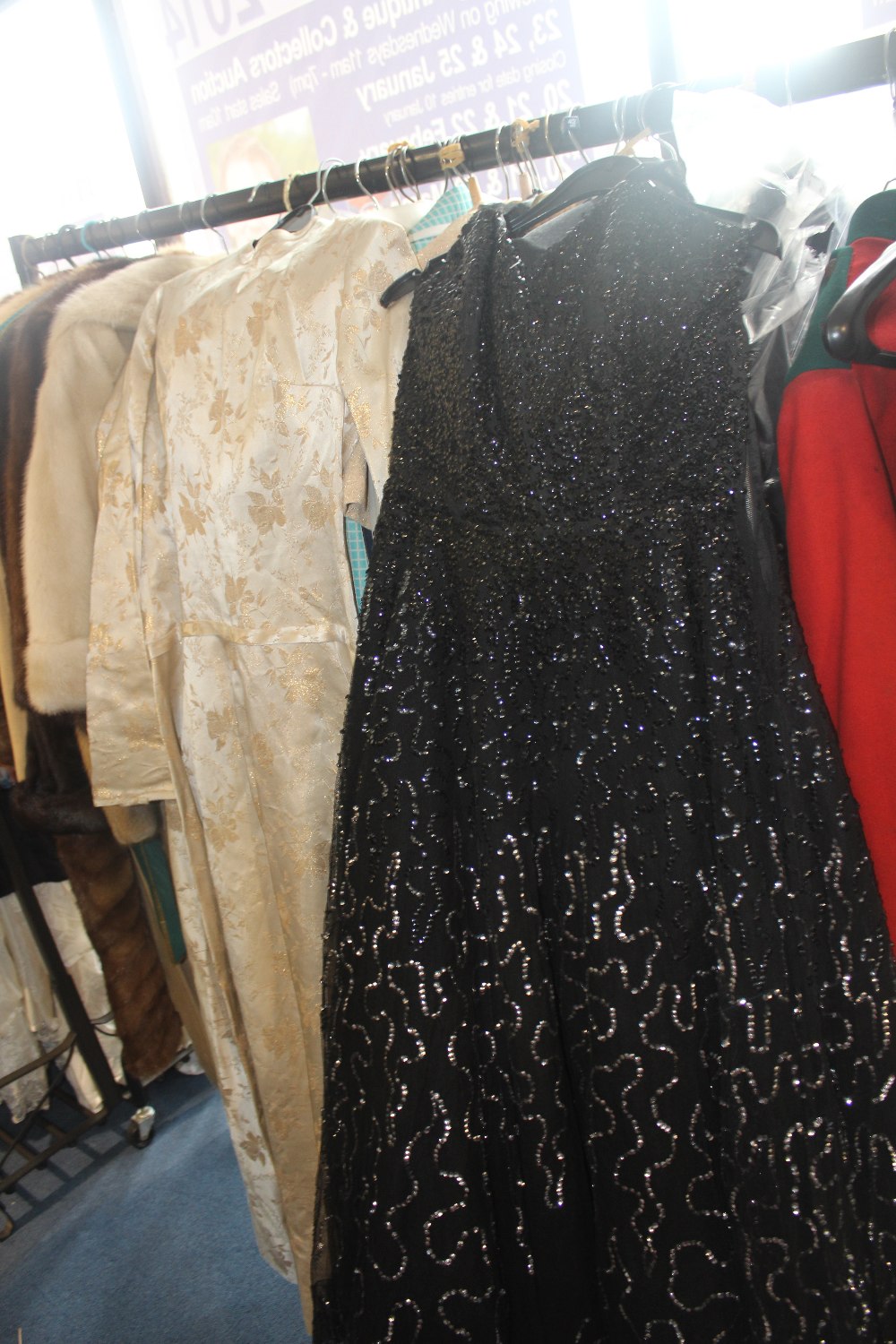 A 1958 circa gold embossed ivory dress, possibly worn as a wedding dress together with a 1956/7