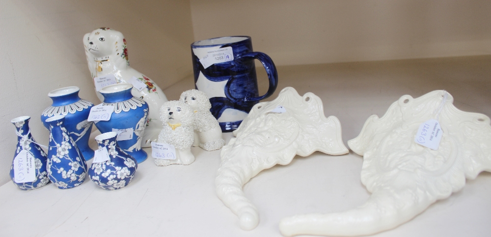 A collection of Staffordshire ceramics including frog mug, Etruscan style vases, dogs, etc