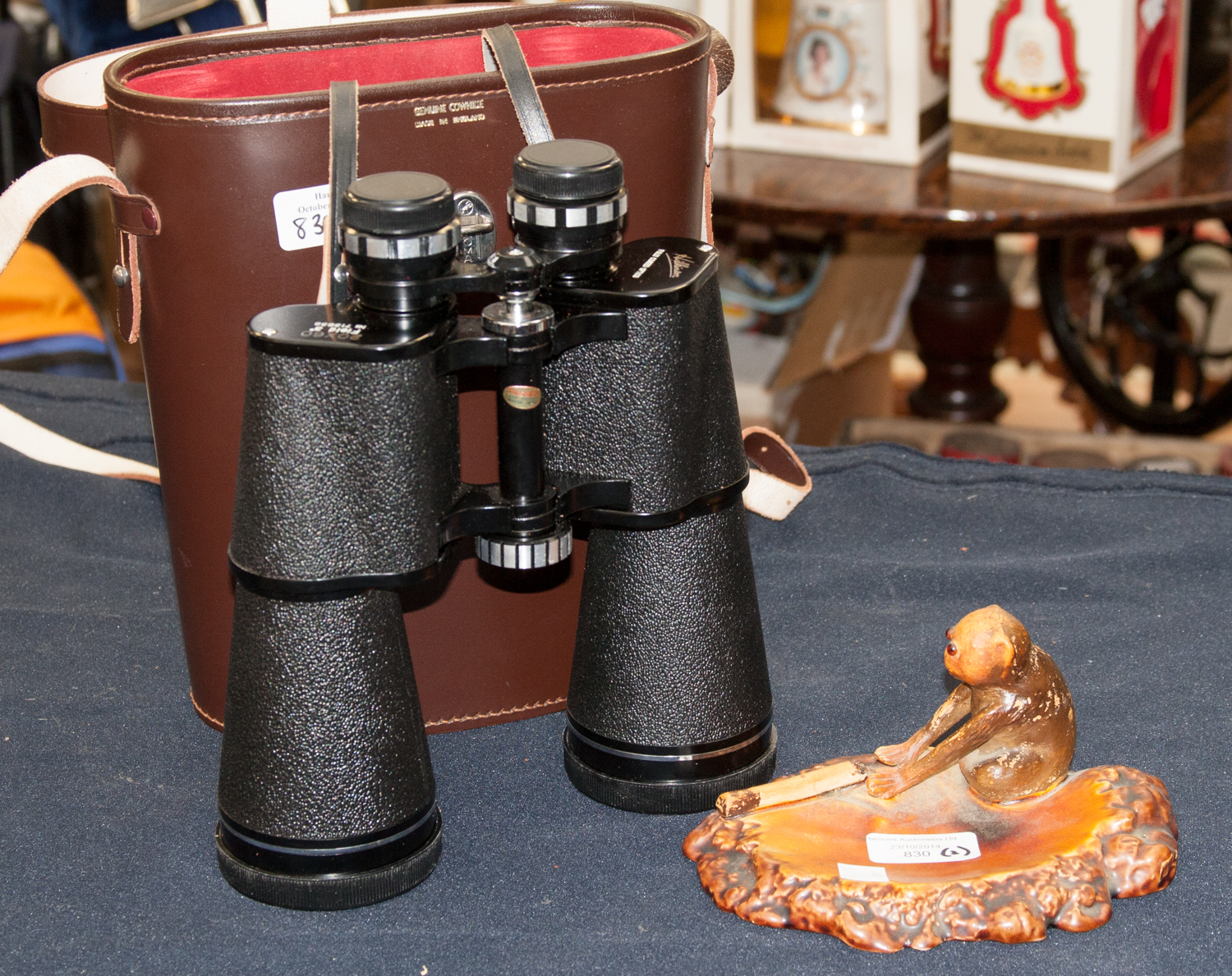 Hilkinson 20 x 60 field glasses in original cow hide case and a Bretby 1823 ashtray