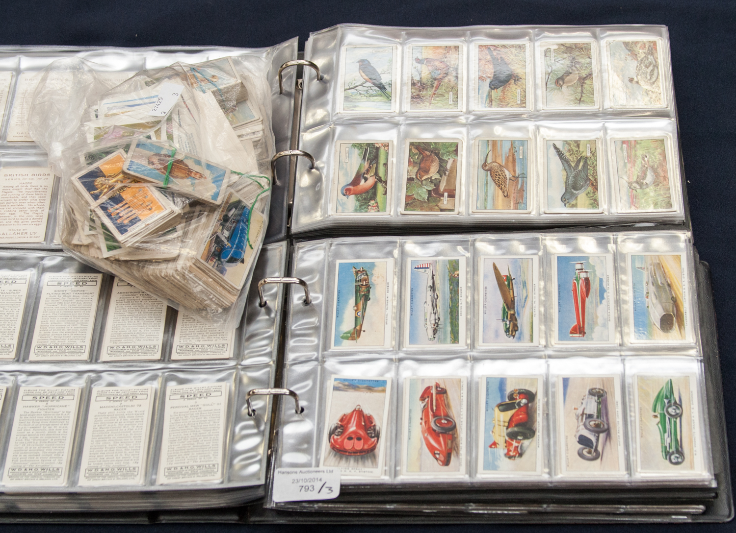 Two albums of cigarette cards to include "Churchmans" - many complete sets and a bag of spare