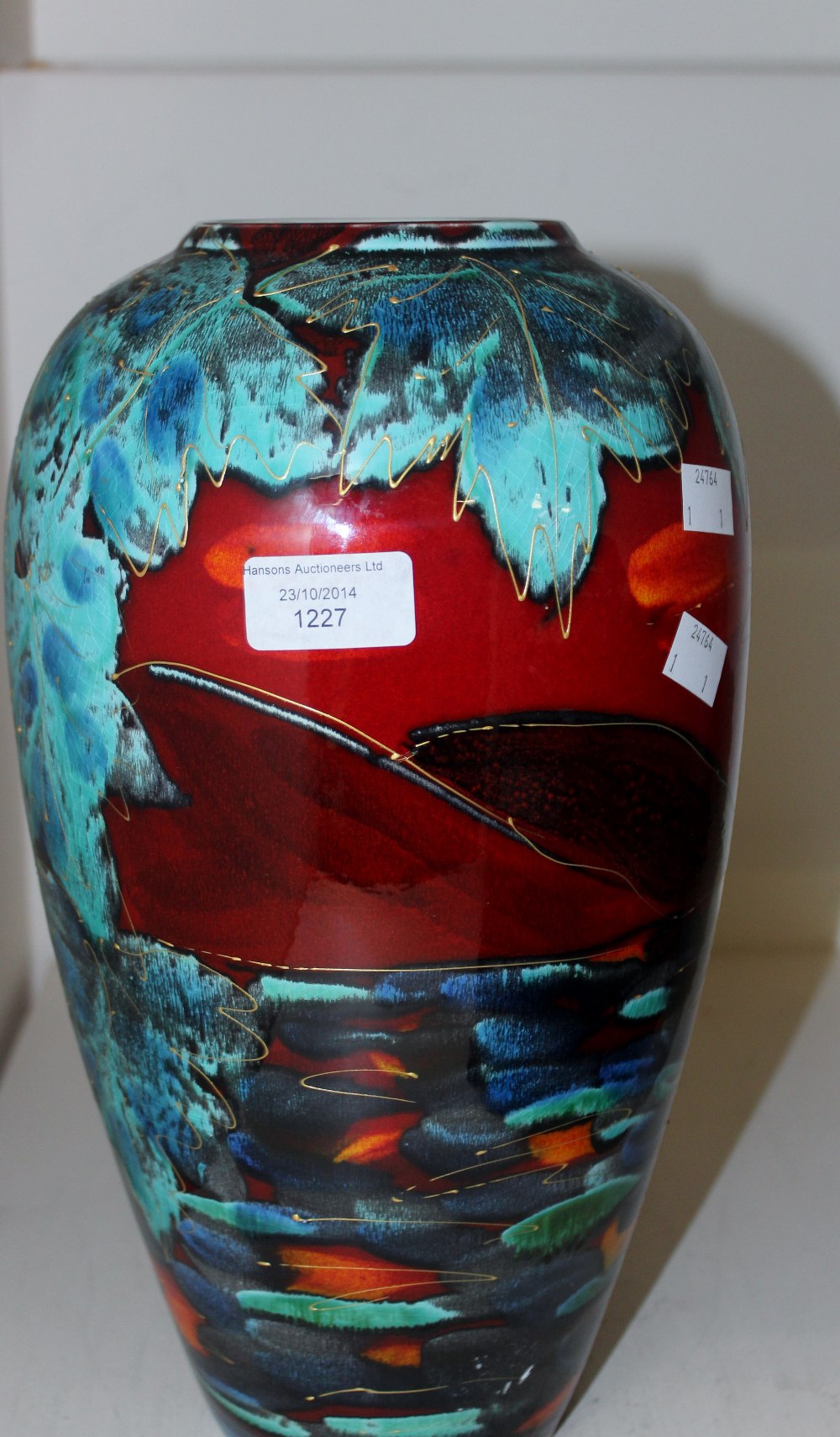 A large Anita Harris studio vase, red, orange, turquoise ground, with gilt details