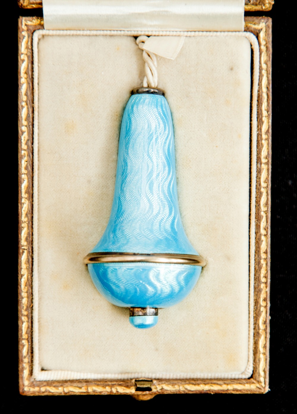 An Asprey silver gilt and guilloché enamel bell pull, with electrical contract, circa 1925, blue