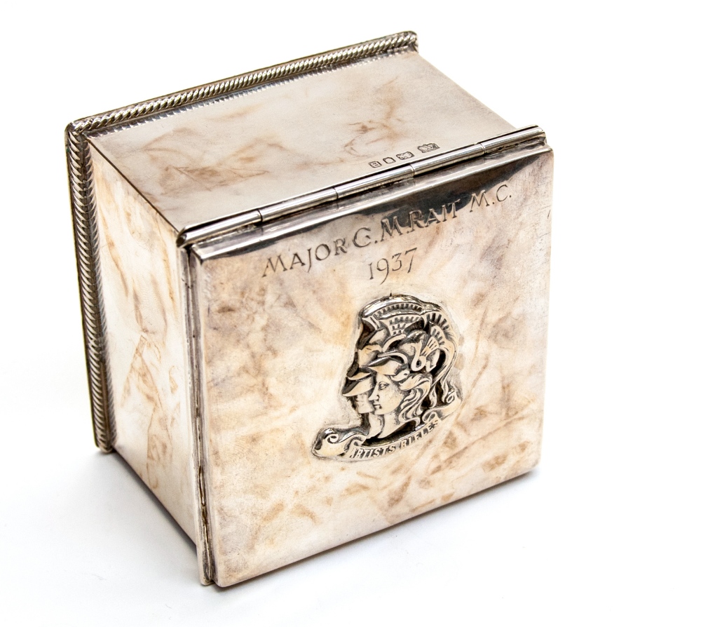 Alwyn Carr, an Arts and Crafts silver box, hand hammered cuboid form with cast badge of the 'Artists