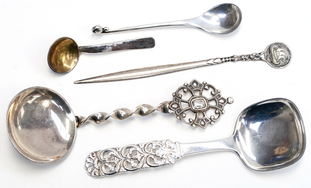 Georg Jensen, a silver salt spoon in a variant of pattern 81, dated 1930, together with two