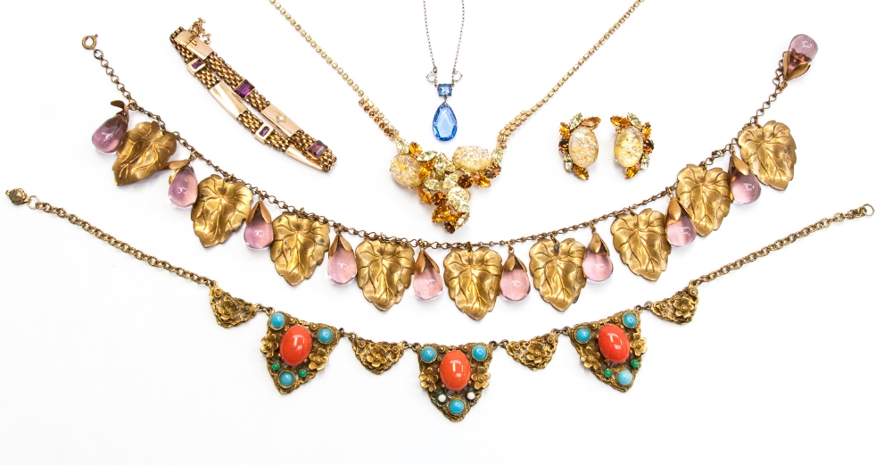 A collection of early 20th century jewellery including a Czechoslovakian grape and vine leaf gilt