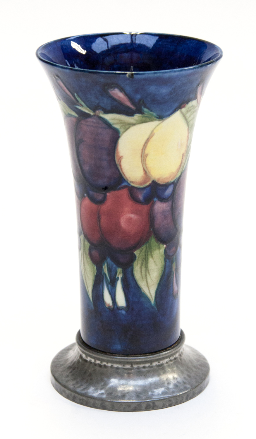 A Tudric Moorcroft vase in Plum Wisteria pattern, for Liberty circa 1930, of flared trumpet form